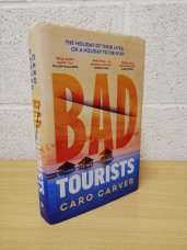 `Bad Tourists` by Caro Carver - First U.K Edition - First Print - Hardback - Bantam - 2024