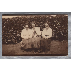 Three Family Members Posing for a Photograph in the Gardenj - Postally Unused - Producer Unknown