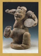`Ceramic Figure of a Squatting Drummer 1st-3rd century AD` - Postally Unused - British Museum Postcard.