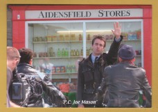 `Heartbeat - `P.C. Joe Mason (Joe McFadden) Outside Aidensfield Stores`- Postally Unused - HPE Print Postcard.