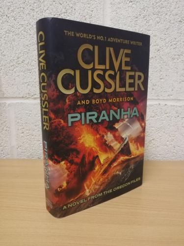 `Piranha` - Clive Cussler and Boyd Morrison - First U.K Edition - First Print - Hardback - Michael Joseph - 2015