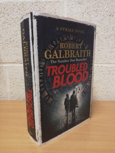 `Troubled Blood (5th Cormoran Strike Novel)` - Robert Galbraith (J. K. Rowling) - First U.K Edition - First Print - Hardback - Sphere - 2018