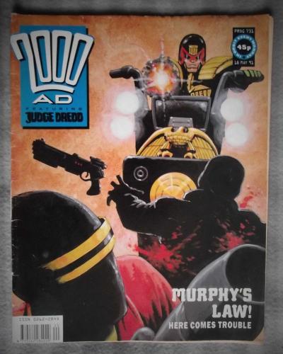 `2000 A.D. Featuring Judge Dredd` - 18th May 1991 - Prog No.731 - `Murphy`s Law!: Here Comes Trouble`.
