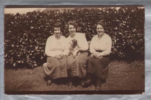 Three Family Members Posing for a Photograph in the Gardenj - Postally Unused - Producer Unknown